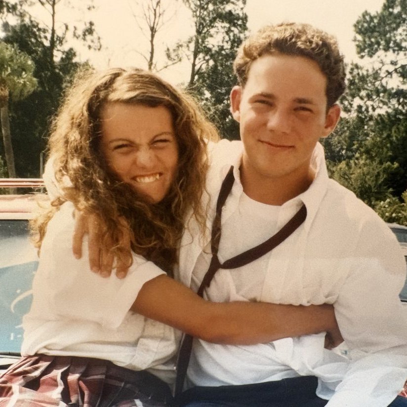Two BKHS classmates smiling together outdoors, 1996
