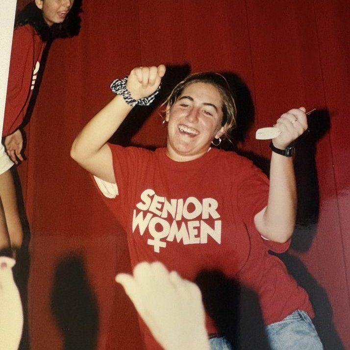 BKHS classmate celebrating in a red 'Senior Women' shirt, 1996