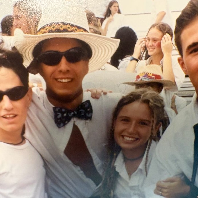 Group of four BKHS classmates dressed up for a senior week spirit day, 1996