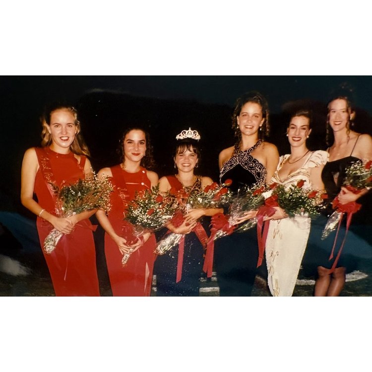 BKHS homecoming court in red dresses holding rose bouquets, 1996